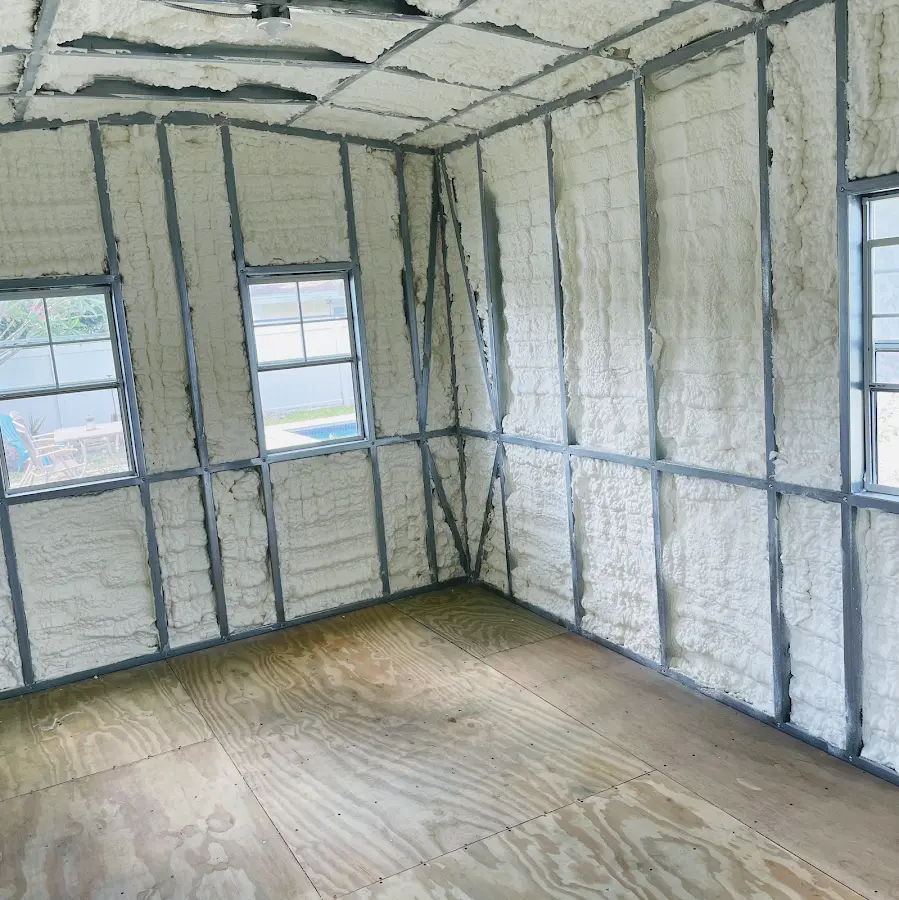 Closed-cell spray foam insulation applied to wall cavities in a residential project in Lewisboro